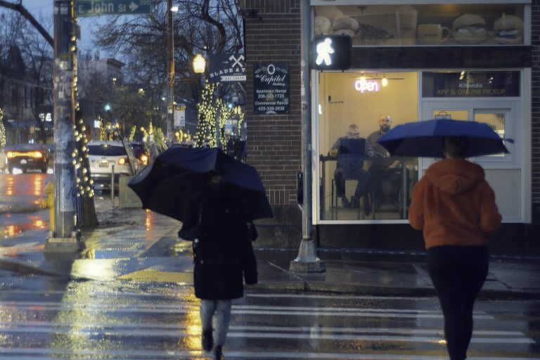 Street photo in Seattle, United States by Milton Garrison