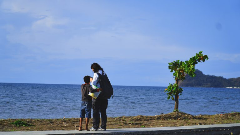 Street photo in Dili, Timor-Leste by Lei Sun