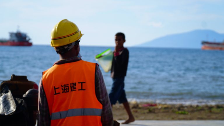 Street photo in Dili, Timor-Leste by Lei Sun