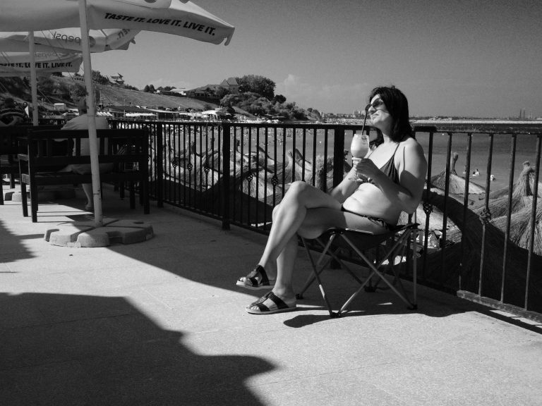 Street photo in Eforie, Romania by Szilard Locsei