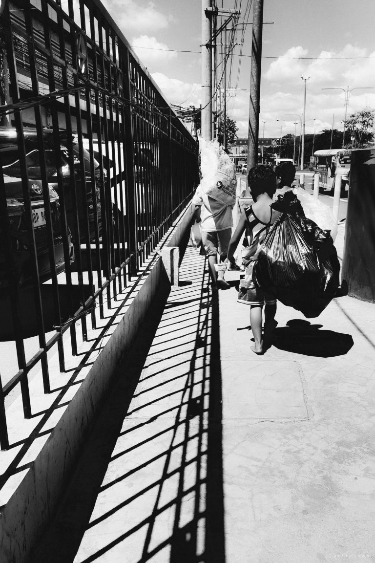 Street photo in Pasay, Philippines by Cha Esquila