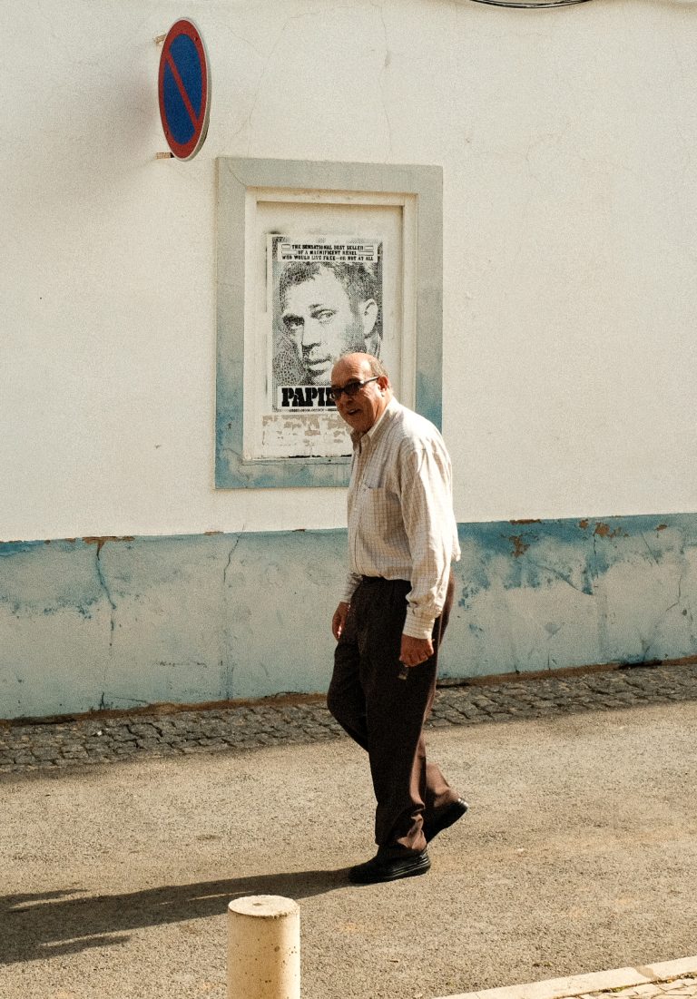 Street photo in Lagos, Portugal by Samual Shears