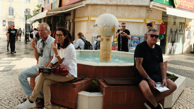 Street photo in Lagos, Portugal by Samual Shears