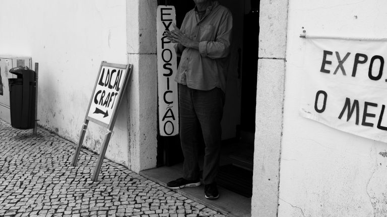 Street photo in Lagos, Portugal by Samual Shears