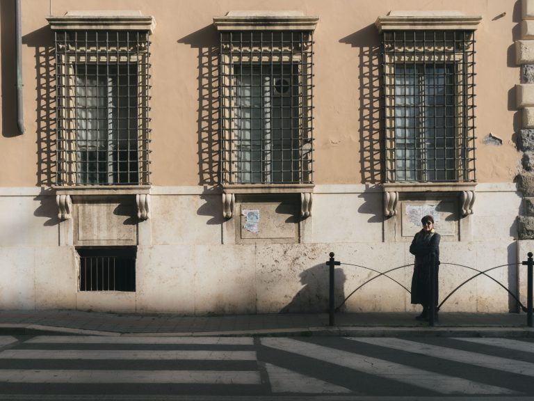 Street photo in Civitavecchia, Italy by Samuel Heinrich