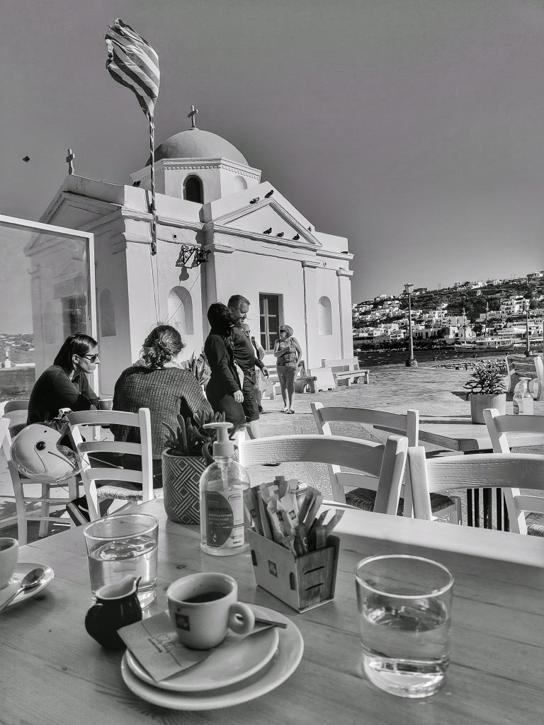 Street photo in Mykonos, Greece by Marco Da Ros