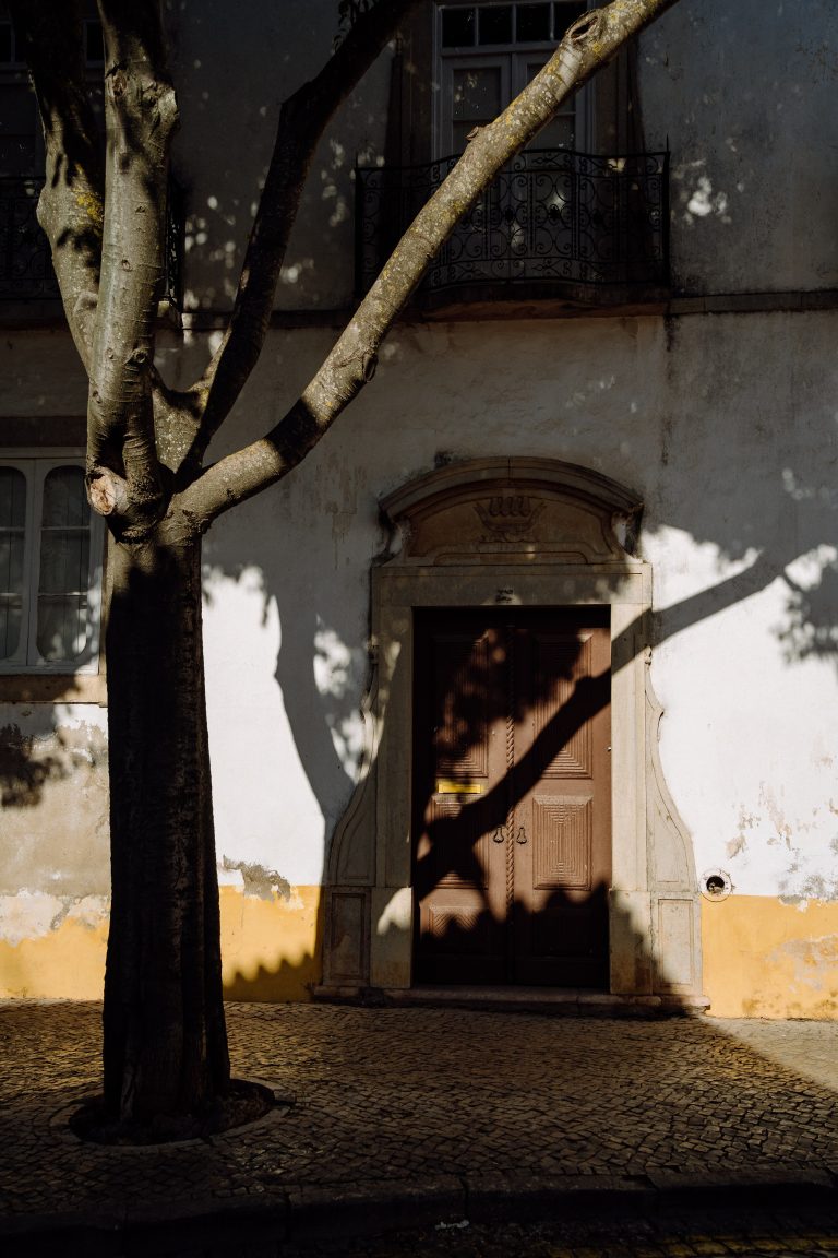Street photo in Tavira, Portugal by Alek Jedliński