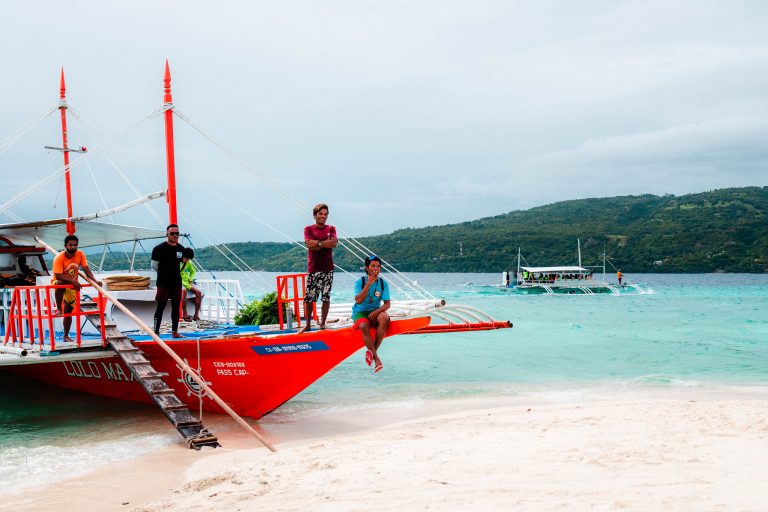 Street photo in Oslob, Philippines by Trevin Blount