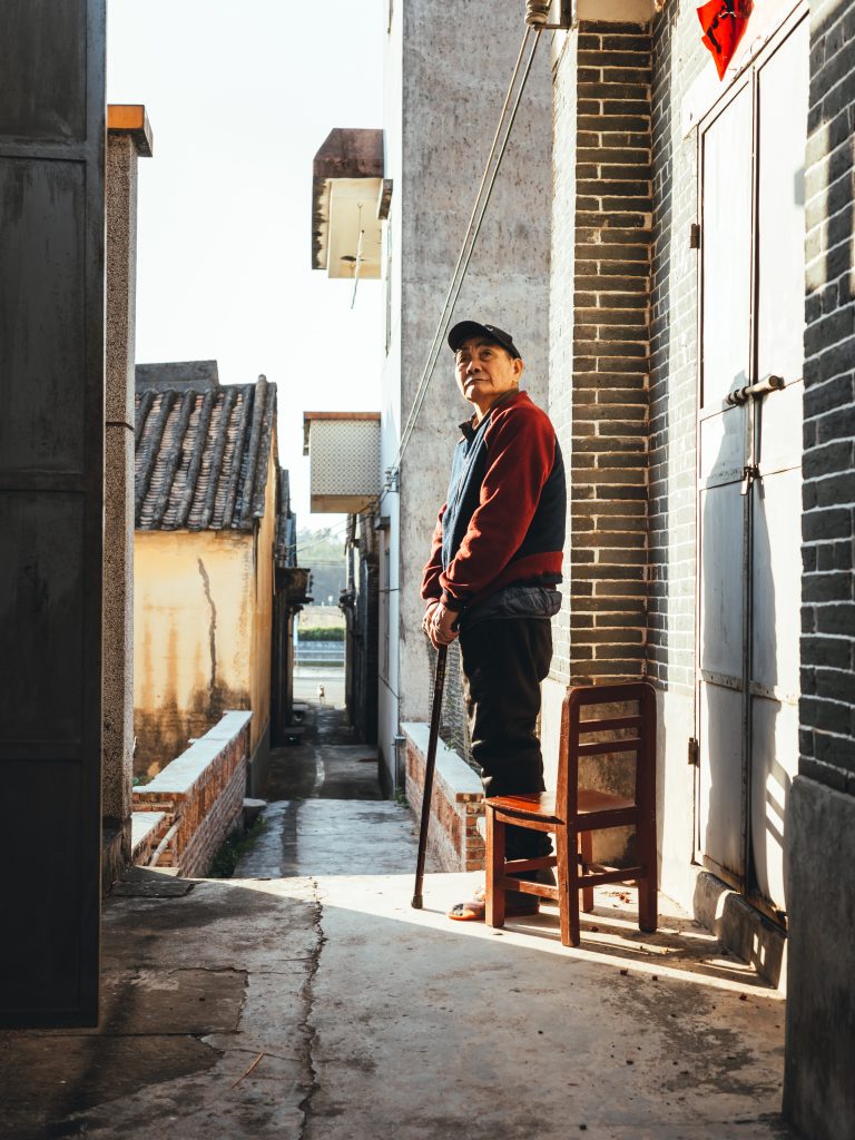 Street photo in Kaiping, China by Andrew Szeto