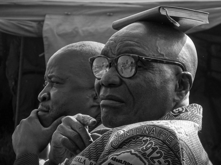 Street photo in Bunia, Democratic Republic of the Congo by Martin Philipps