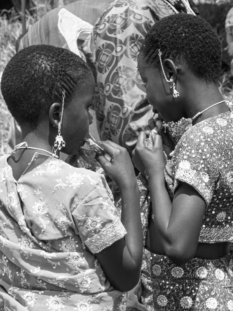 Street photo in Bunia, Democratic Republic of the Congo by Martin Philipps