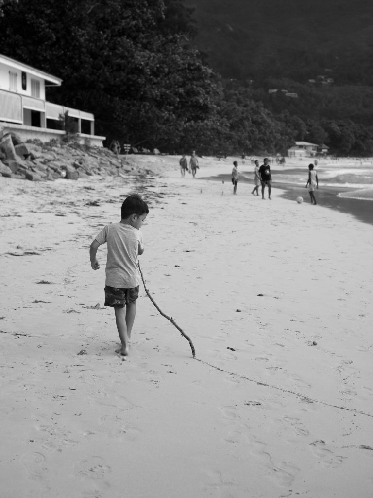 Street photo in Beau Vallon, Seychelles by Arina Gusakovskaya