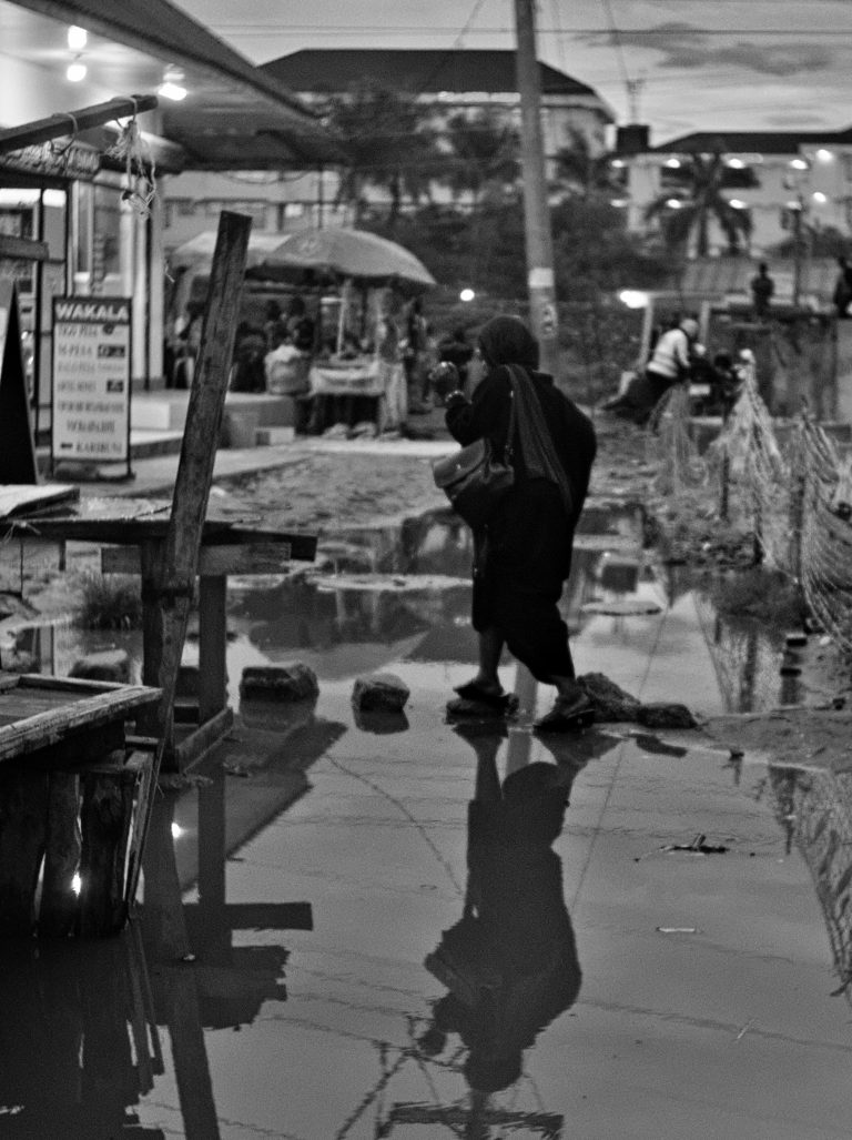 Street photo in Dar es Salaam, Tanzania by Stewart Ayling