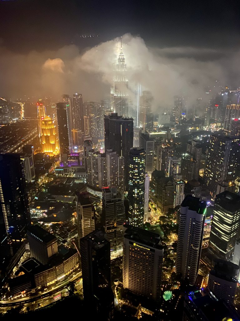 Street photo in Kuala Lumpur, Malaysia by Sukhdev Singh