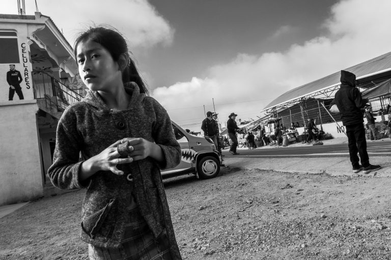 Street photo in Caserío Chutinamit, Guatemala by Duncan Aitken