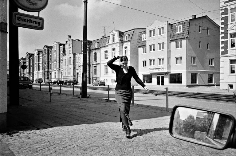 Street photo in Schwerin, Germany by Alexander Philipps