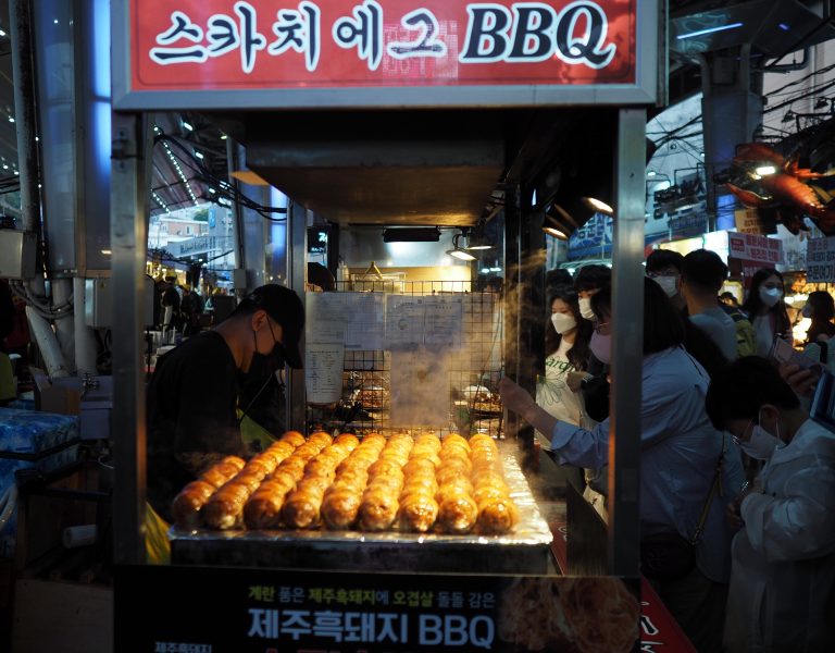 Street photo in Jeju, South Korea by Jay Kay