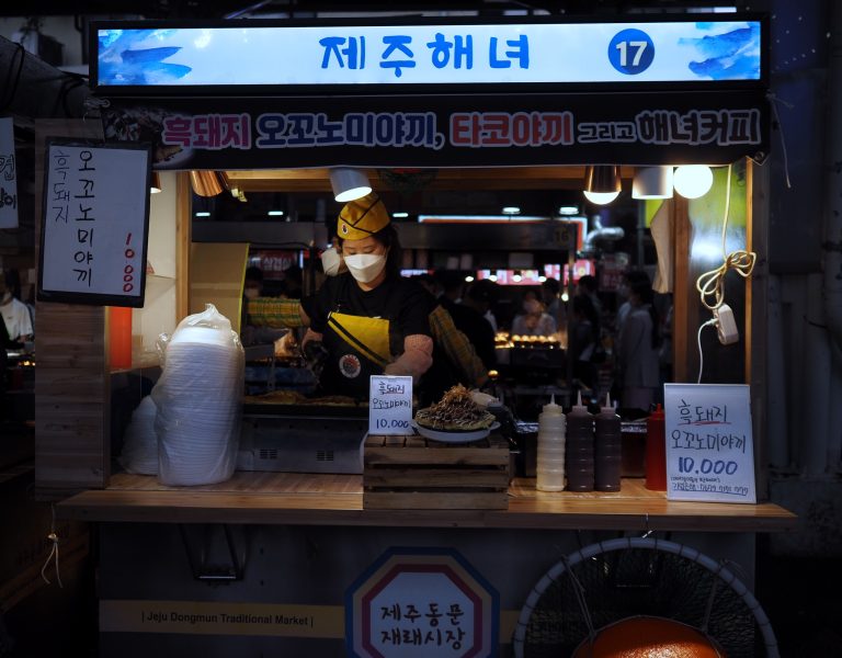 Street photo in Jeju, South Korea by Jay Kay