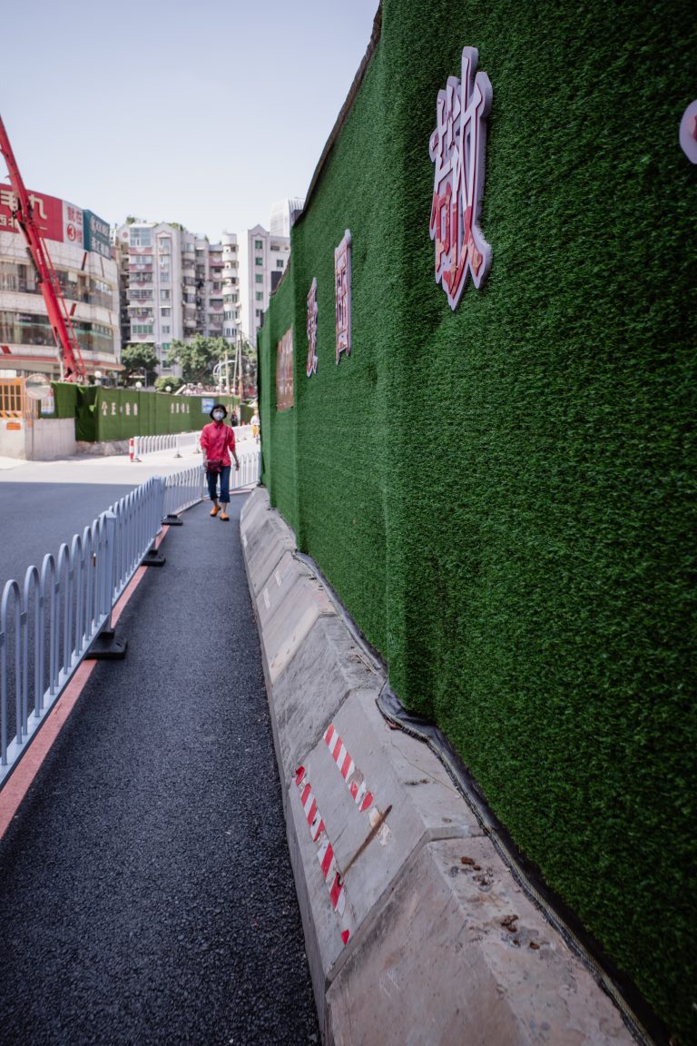 Street photo in Jiang Tai Lu, China by Craig Meakin