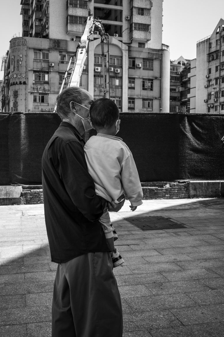 Street photo in Jiang Tai Lu, China by Craig Meakin