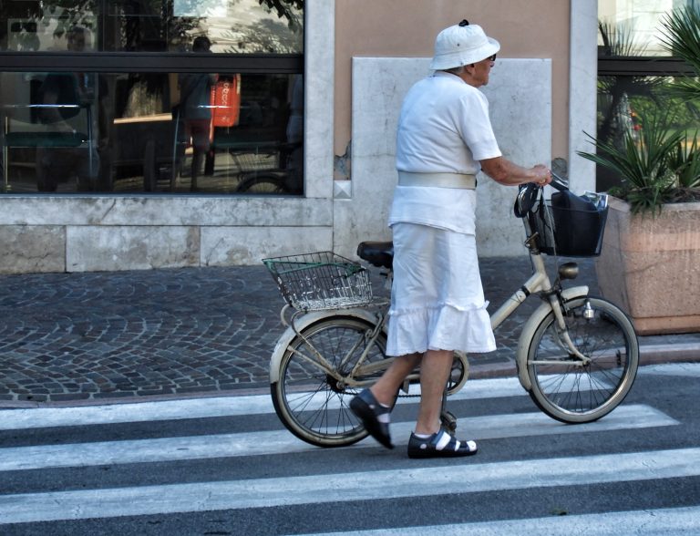 Street photo in Lake Garda, Italy by Lio Day