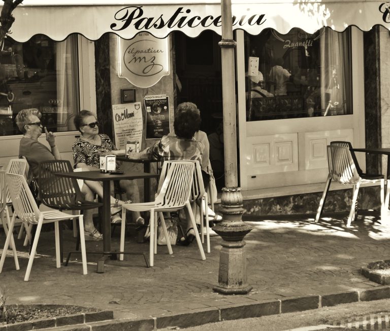 Street photo in Lake Garda, Italy by Lio Day