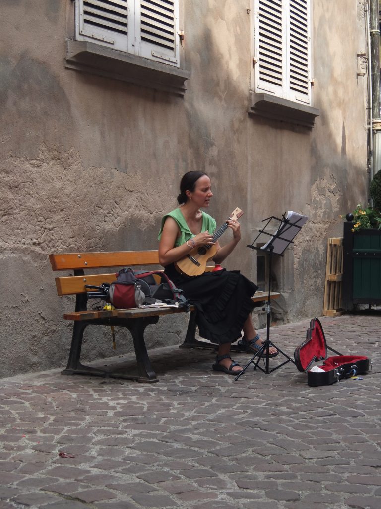 Street photo in Colmar, France by Lio Day