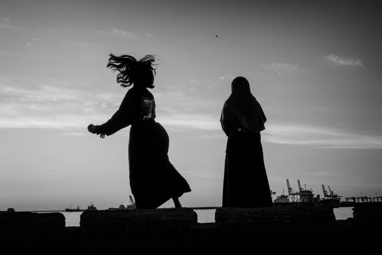Street photo in Makassar, Indonesia by Chris Batis