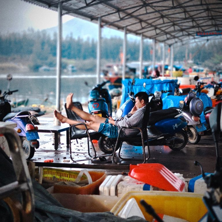 Street photo in Sanya, China by Matt Fiji