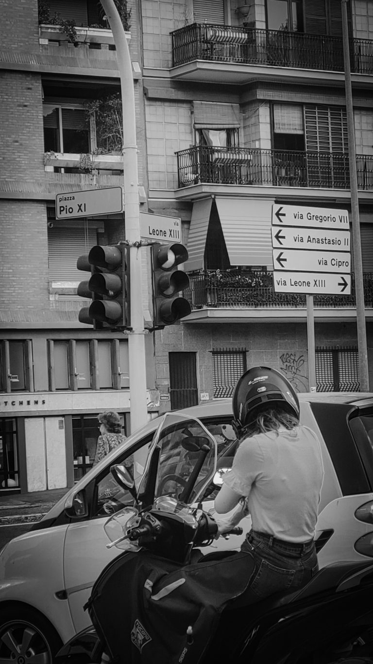 Street photo in Rome, Italy by Rashad Caldwell