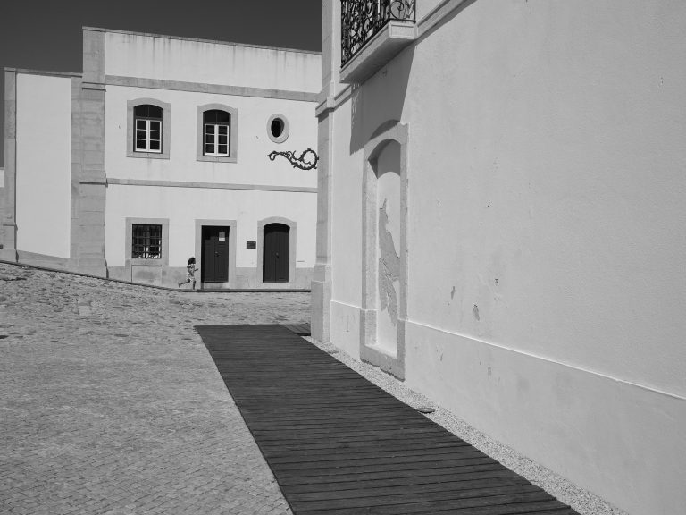 Street photo in Sesimbra, Portugal by Jose Mendes De Almeida