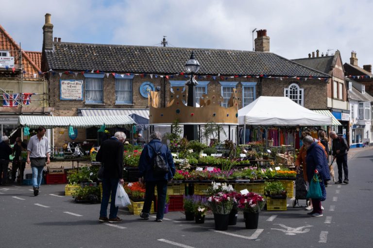 Street photo in Southwold, United Kingdom by Iain Capie