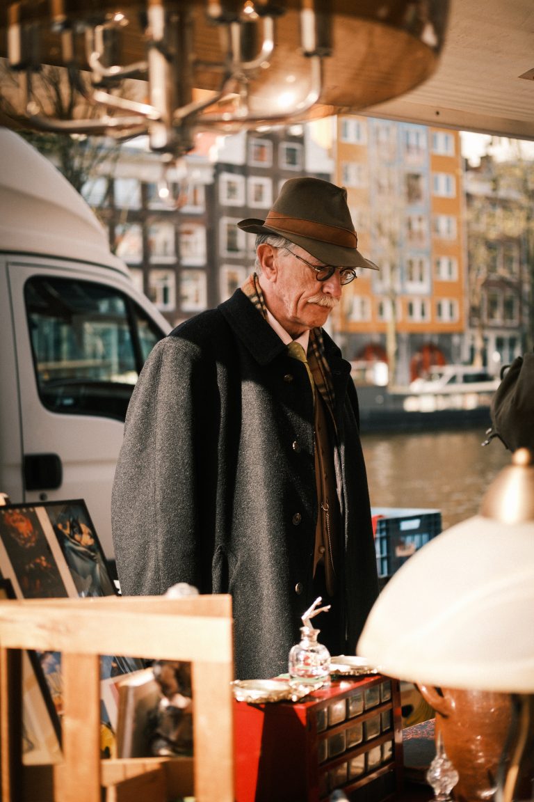 Street photo in Waterlooplein, Netherlands by Nico de Vries