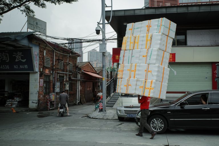 Street photo in Jiang Tai Lu, China by Craig Meakin