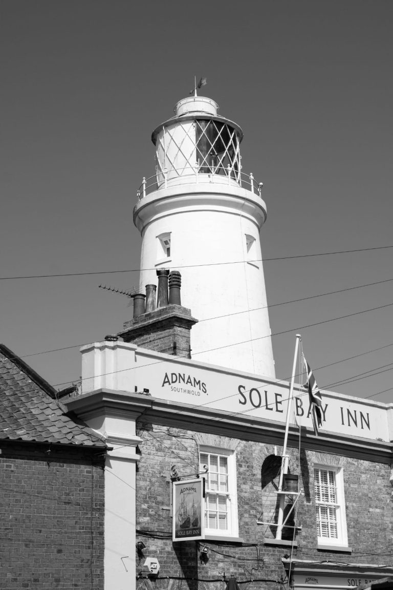 Street photo in Southwold, United Kingdom by Iain Capie
