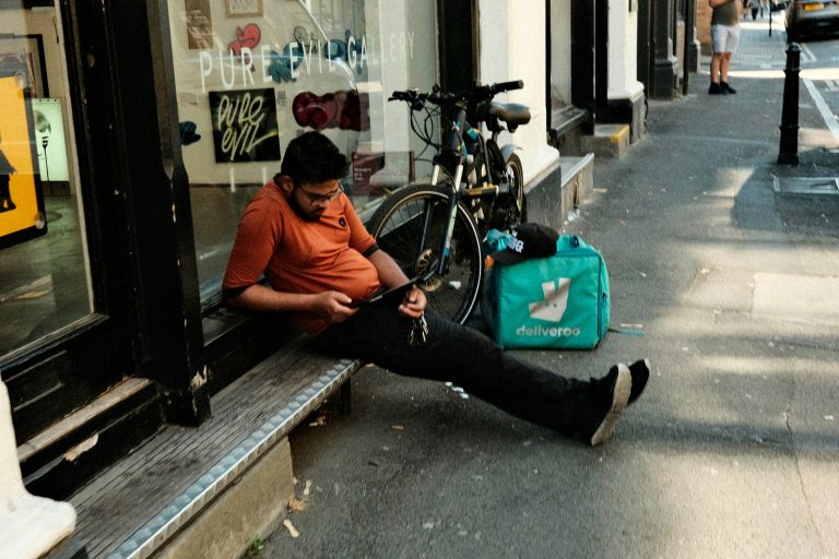 Street photo in London, United Kingdom by Jake Witham