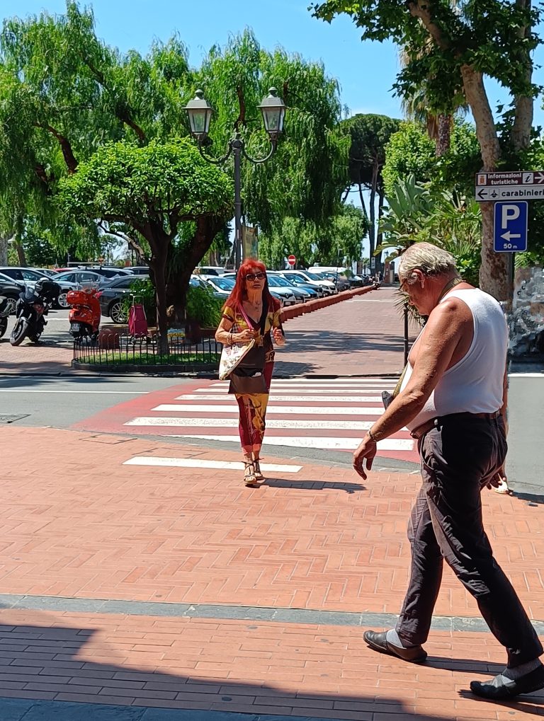 Street photo in Ventimiglia, Italy by Lio Day