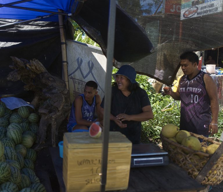 Street photo in Surigao, Philippines by David Sheppard
