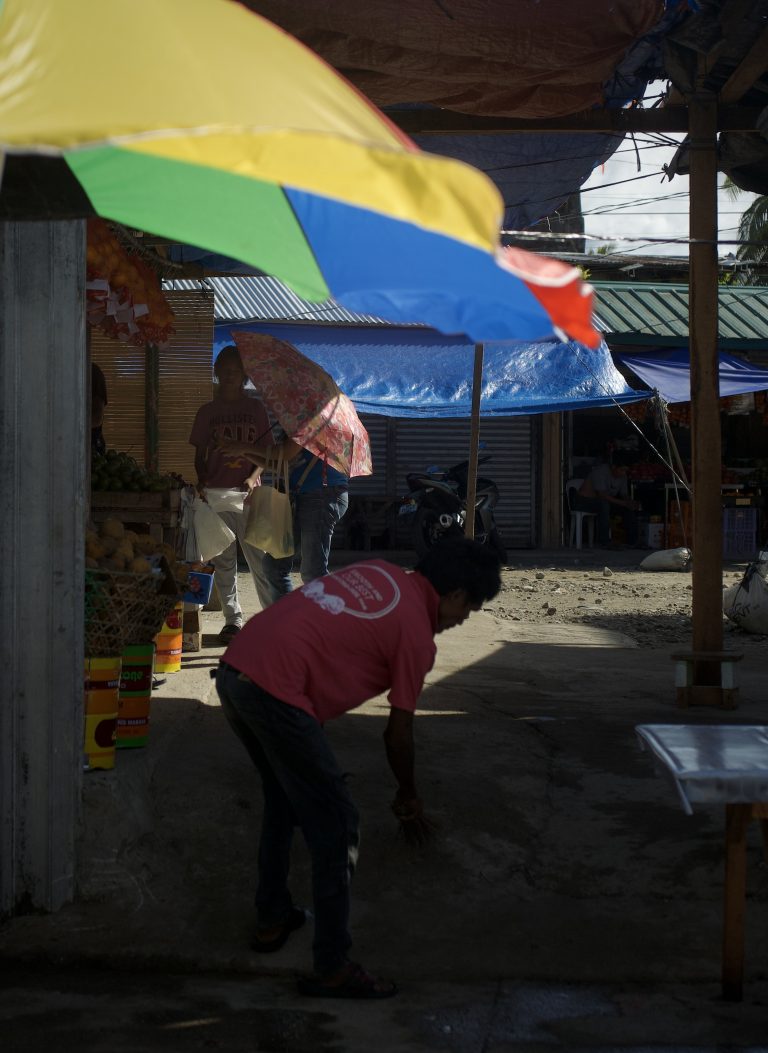 Street photo in Surigao, Philippines by David Sheppard