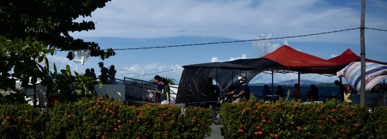 Street photo in Surigao, Philippines by David Sheppard