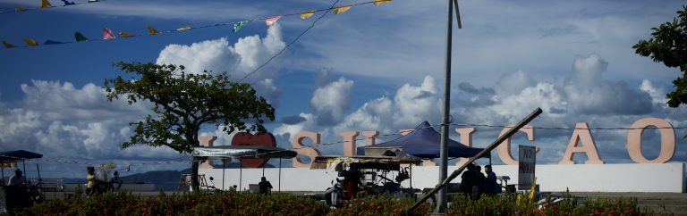 Street photo in Surigao, Philippines by David Sheppard