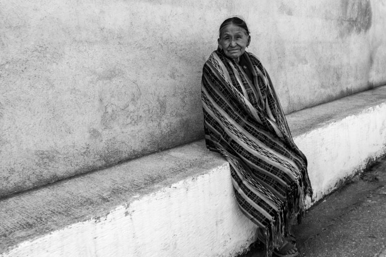 Street photo in Xeatzan, Guatemala by Duncan Aitken