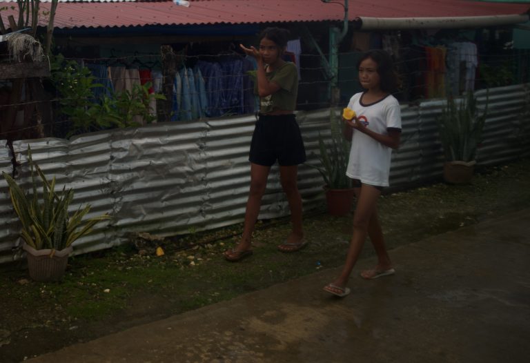Street photo in Surigao del Norte, Philippines by David Sheppard