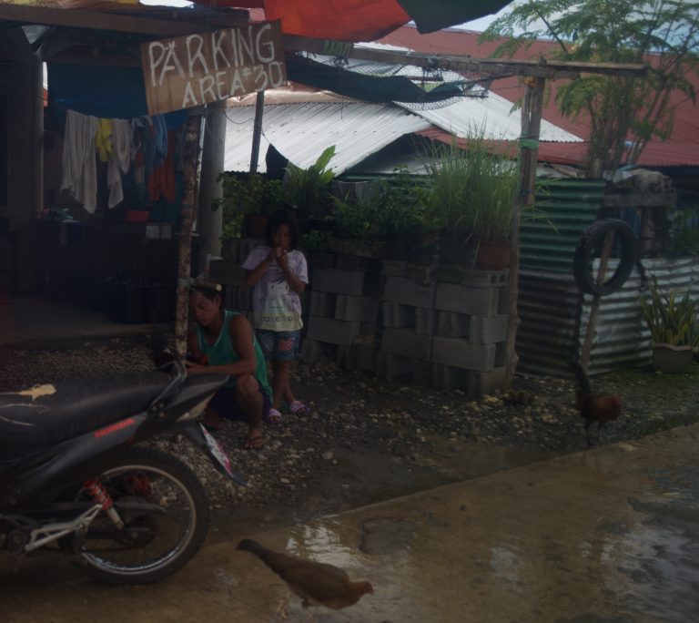 Street photo in Surigao del Norte, Philippines by David Sheppard
