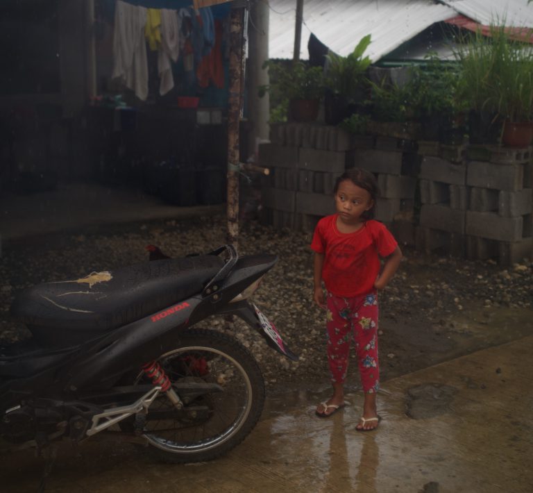 Street photo in Surigao del Norte, Philippines by David Sheppard