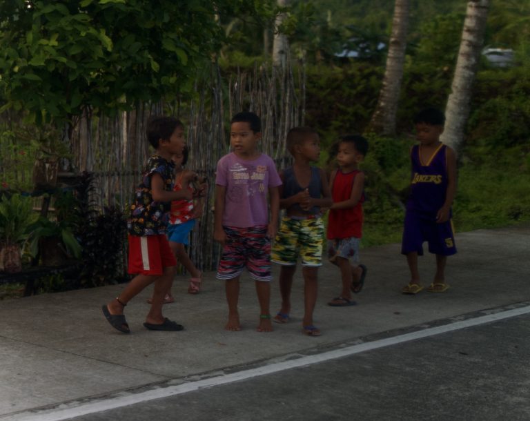 Street photo in Surigao del Norte, Philippines by David Sheppard