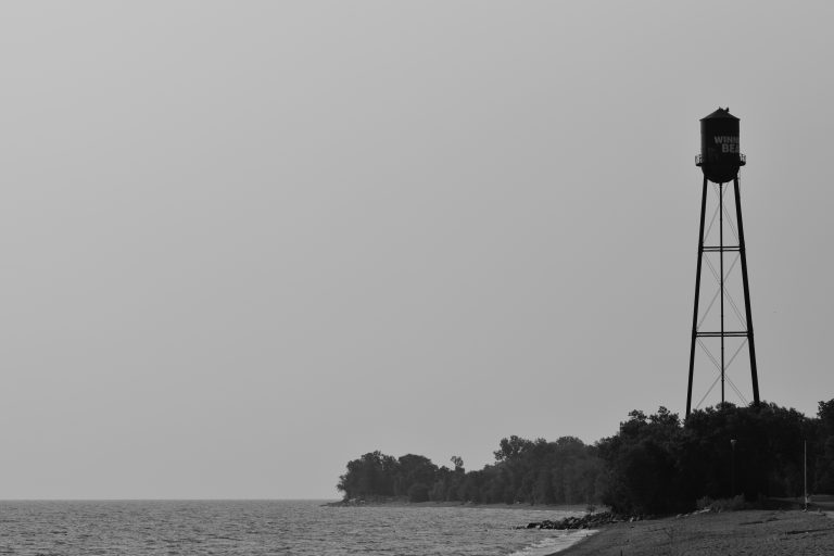 Street photo in Winnipeg Beach, Canada by Mike Carter