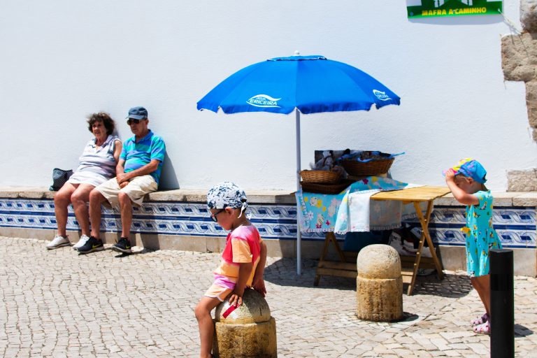 Street photo in Ericeira, Portugal by João Sundfeld