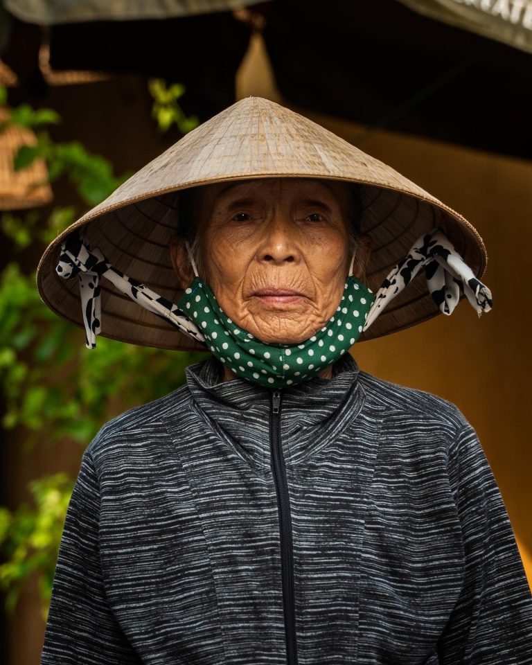 Street photo in Hội An, Vietnam by Mihalis Lindos