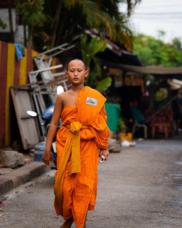 Street photo in Luang Prabang, Laos by Mihalis Lindos